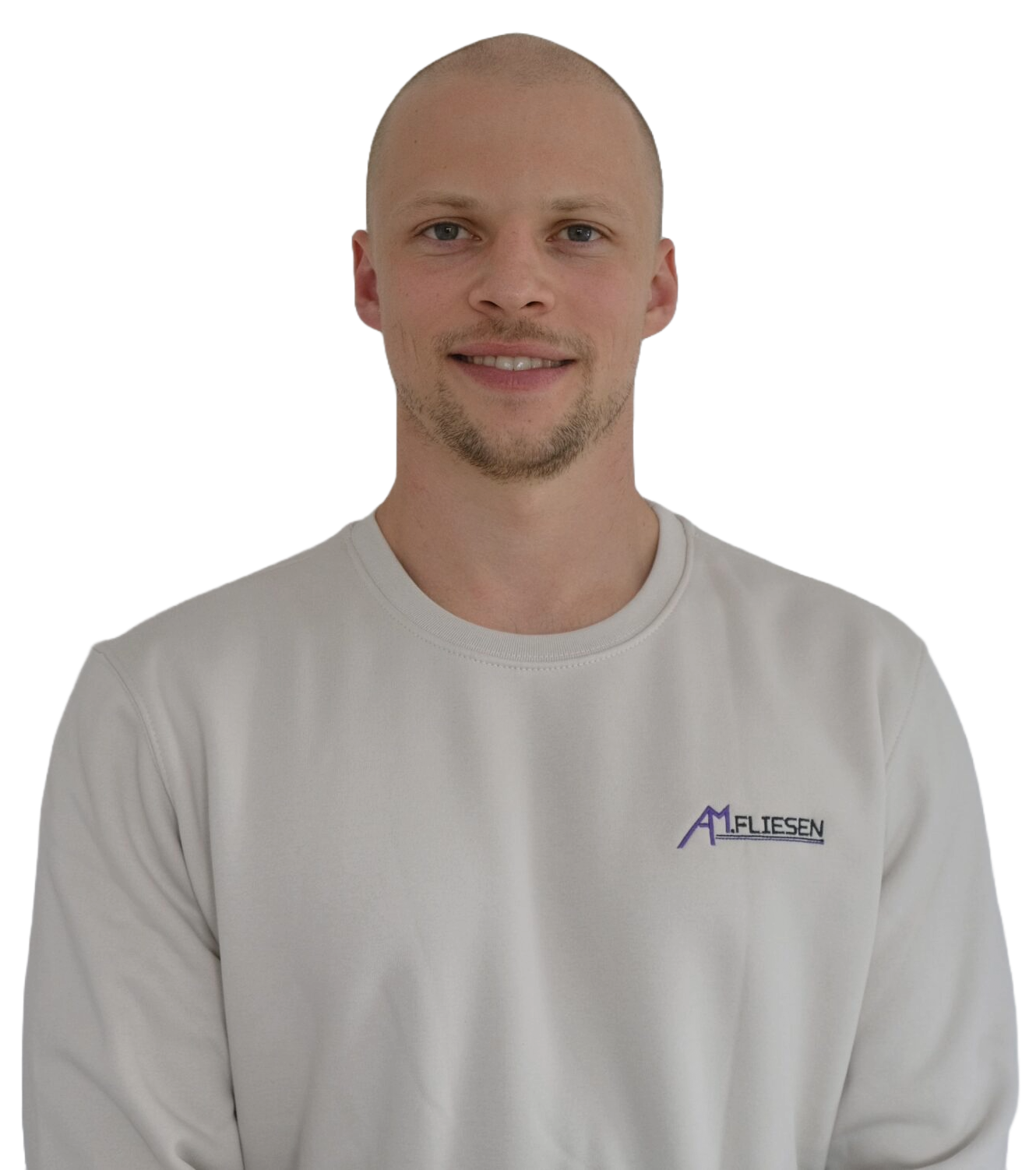 Maximilian Kies in einen weißen Pullover.